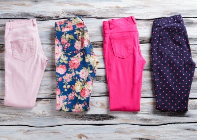 Pants of different color.